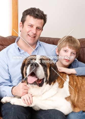 mand and boy with a Saint Bernard