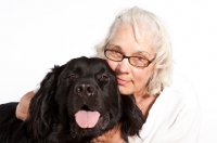 Picture of Newfoundland mixed breed with older woman